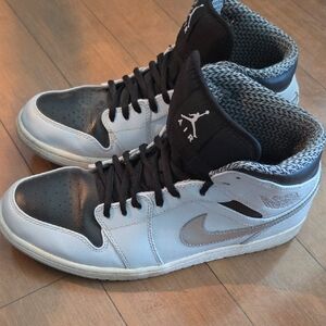 Jordan Men's Black and White High-Top Sneakers